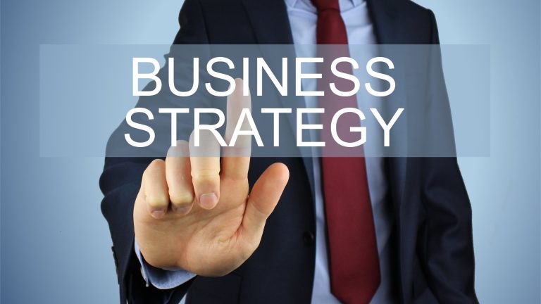 Business-analysts-poiting-out-to-Business-Strategy-caption