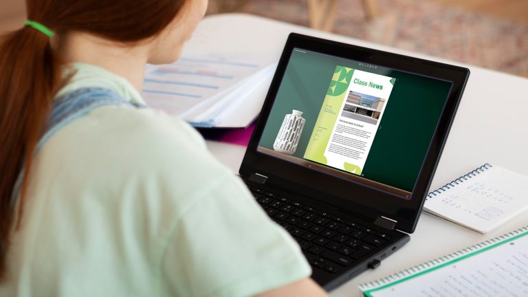 girl-reading-a-class-news-in-an-online-newspaper-on-a-laptop
