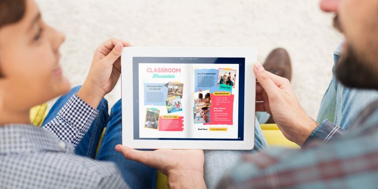 family-reading-school-newspaper-with-visual-elements