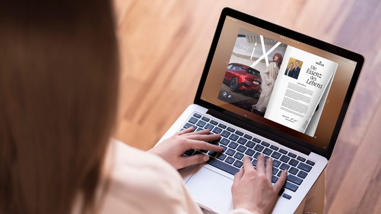 woman reading business car magazine