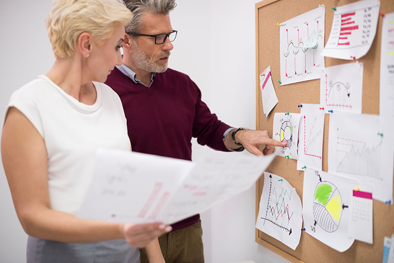 indicating valid documents on a corkboard in a business plan presentation