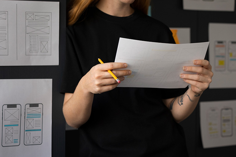 Strengthening documents with branding designer reviewing branded document layouts